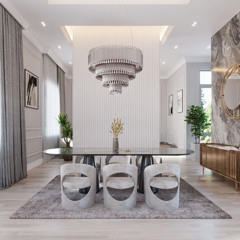 white dining room with a big luxury chandeliers