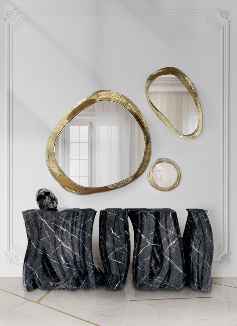 wall mirror set in beautiful geometric lines and a black marble console